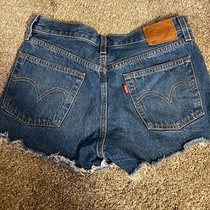 Levi’s- dark wash Jean short. Size womens 27.